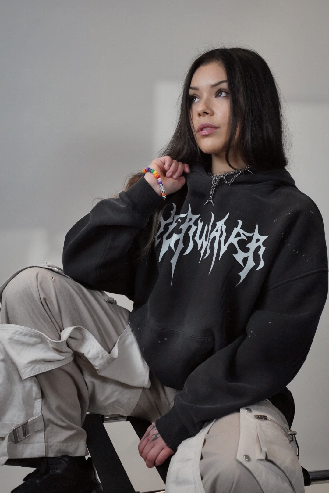 Front view of the Cyber Waver Hoodie in a vintage wash, featuring bold ‘Cyber Waver’ text in a clean font on the chest. Oversized fit with a grunge-inspired streetwear vibe