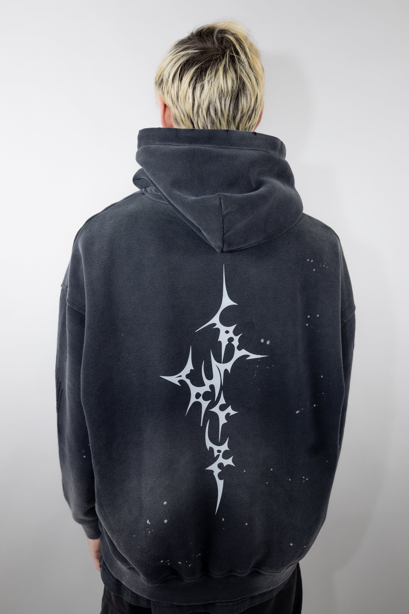 Cyber Sigilism hoodie by CyberWaver, designed for ravers and digital mystics, featuring a central cyber sigil cross, gothic logo print, and distressed fabric details.