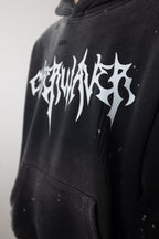 CyberWaver logo in bold gothic typography on the front of a black oversized hoodie, embodying cyber sigilism and subculture streetwear influences.