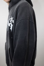CyberWaver hoodie sleeve detail with subtle distressed markings and a minimalist cyber sigil engraving, adding to the cyberpunk and underground aesthetic