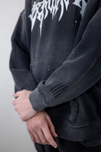 CyberWaver hoodie sleeve detail with subtle distressed markings and a minimalist cyber sigil engraving, adding to the cyberpunk and underground aesthetic