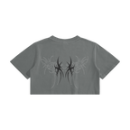 Gray crop top with black tribal design on the back against a white background